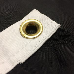brass grommet on pirate flag